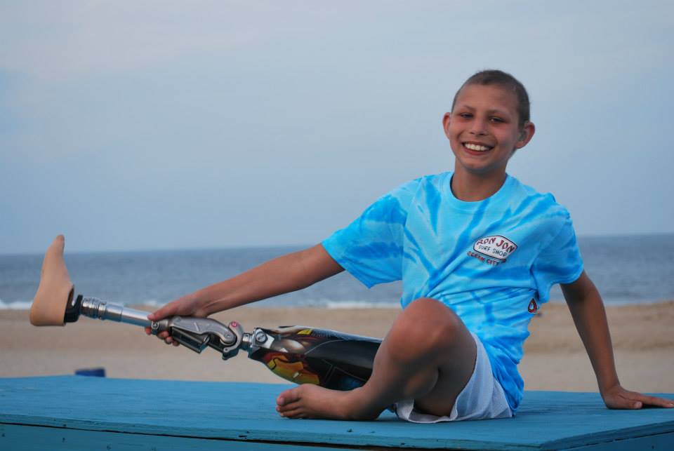 Young boy smiling while enjoying a Believe In Tomorrow respite trip