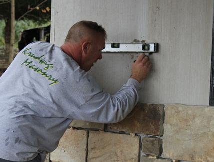 Believe In Tomorrow Volunteer completing construction at The Children's House at Deep Creek Lake
