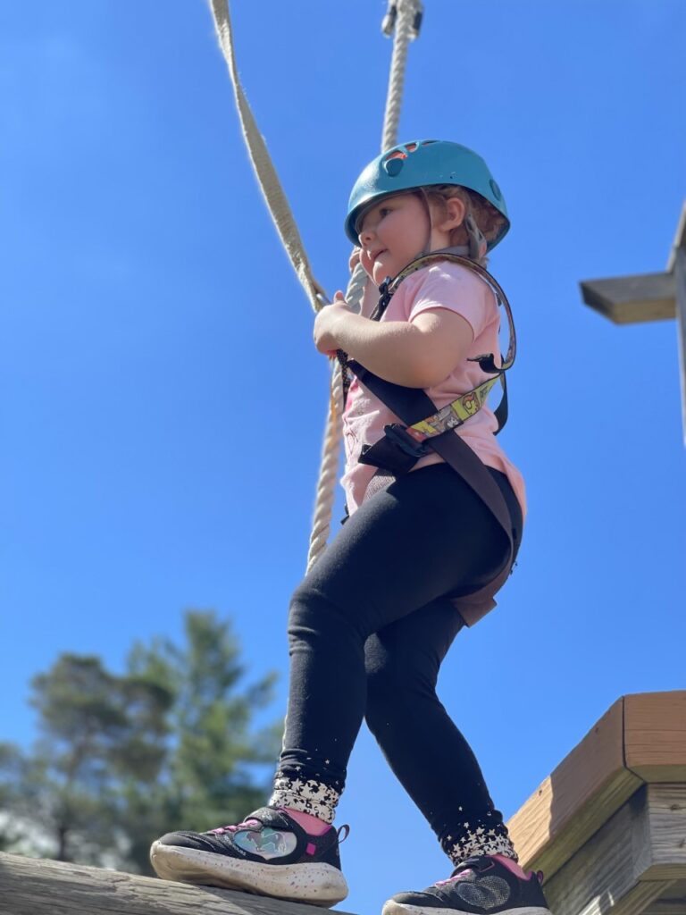 A young gurl enjoying a believe in tomorrow trip