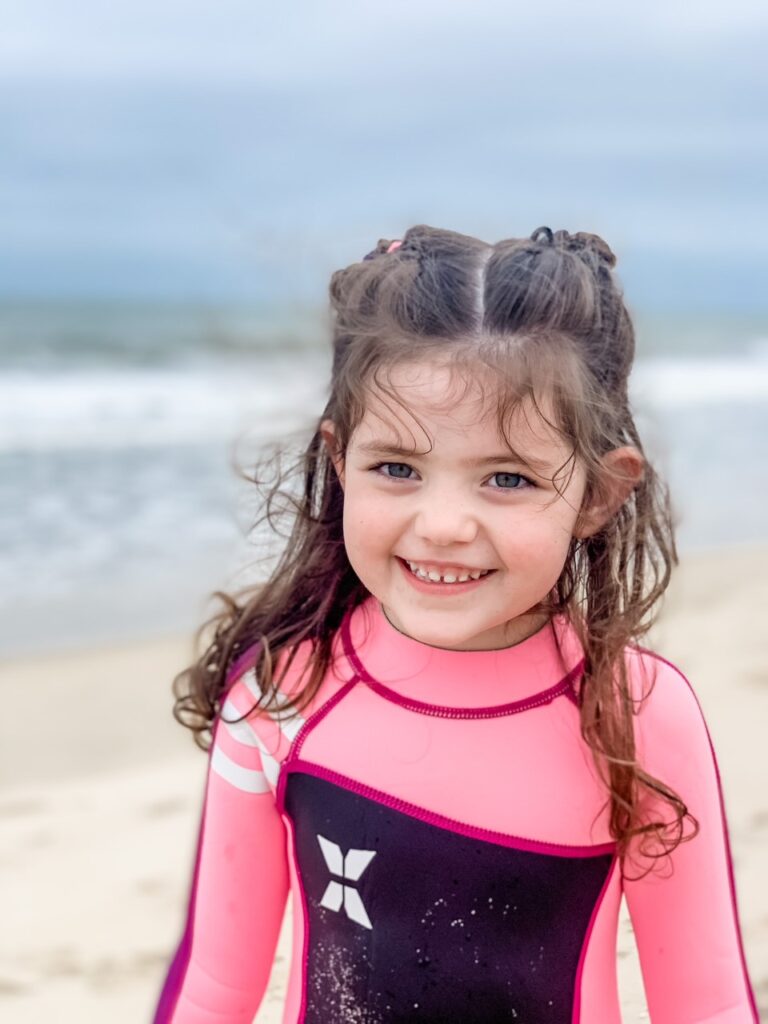 A young girl enjoying her Believe In Tomorrow respite, read her story